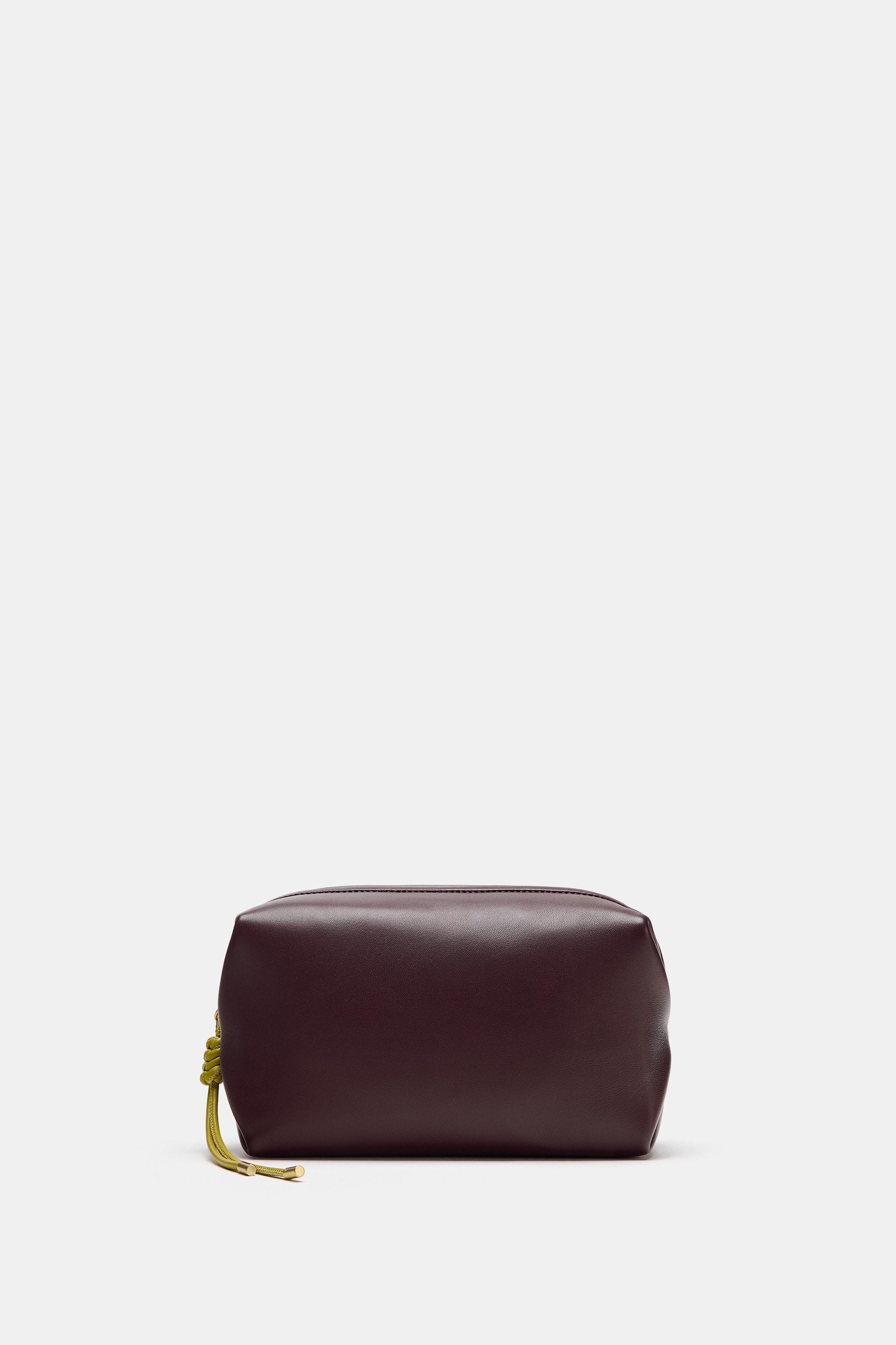 TROUSSE EN CUIR